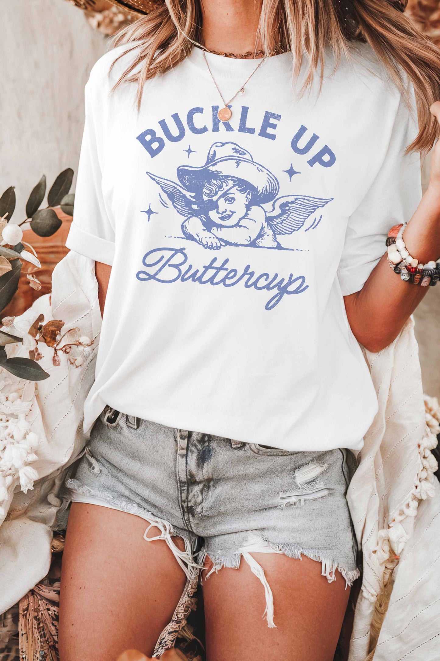 T-shirt oversize con stampa "Buckle Up Buttercup"