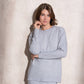 Completo in maglia scintillante due pezzi con gonna midi