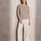 Maglione in maglia di lurex con scollo a V