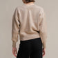 Maglione corto tweed con doppio scollo a V