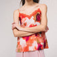 Top stampato con pizzo e scollo a V