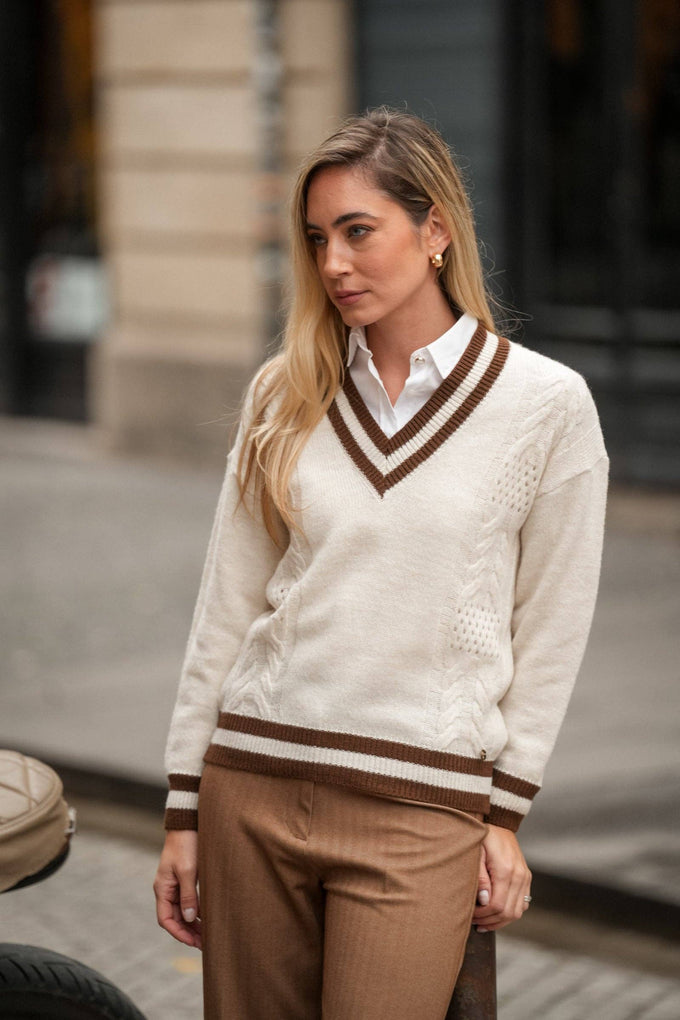 Maglione in maglia con scollo a V a righe