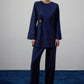 Camicetta drappeggiata blu navy con accessorio in metallo