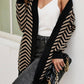 Cardigan smanicato in maglia color vino