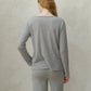 Maglione in lana merino extrafine con scollo a barchetta a maglia 3D
