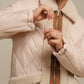 Giacca trapuntata bicolor con profili teddy e zip