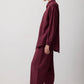 Completo con camicia a quadri e pantaloni bordeaux
