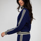 Giacca sportiva Halbator blu con collo alto e zip