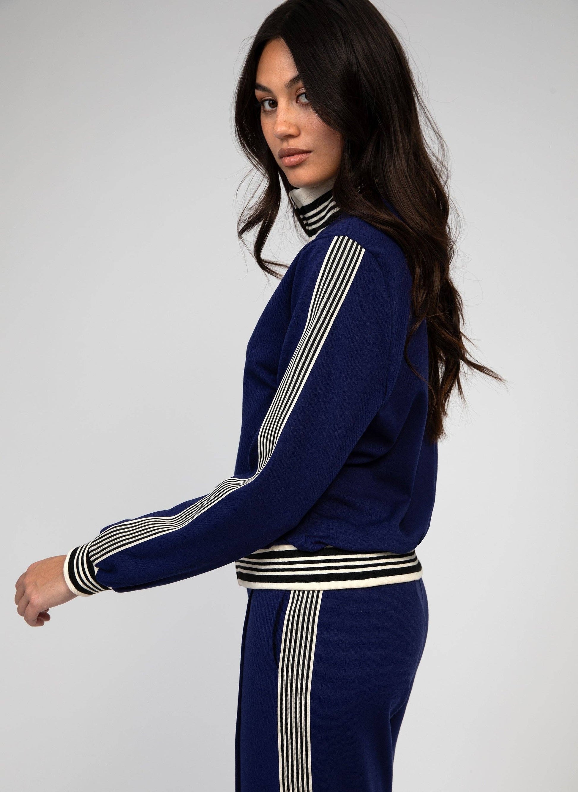 Giacca sportiva Halbator blu con collo alto e zip