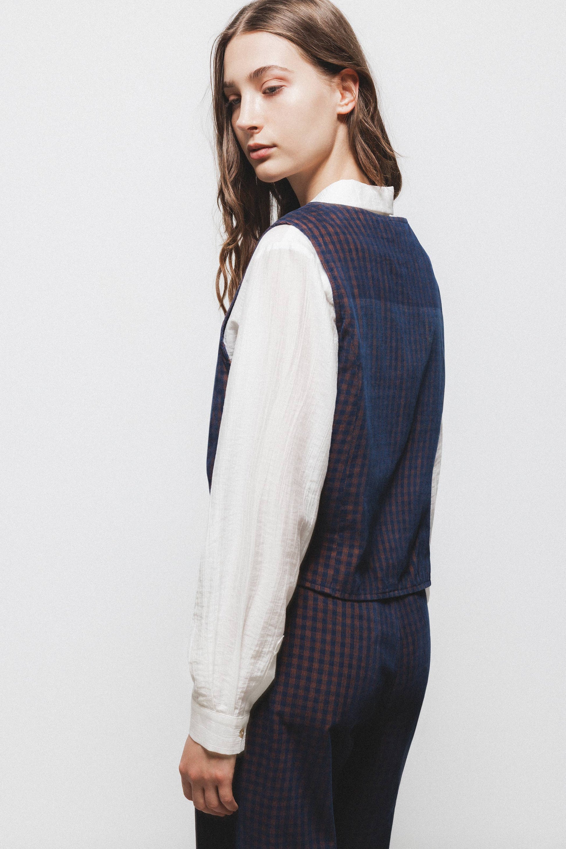 Gilet a quadri con scollo a V