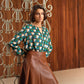 Blusa in viscosa con fibbia e stampa geometrica