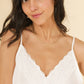 Top camisole in raso con scollo a V in pizzo