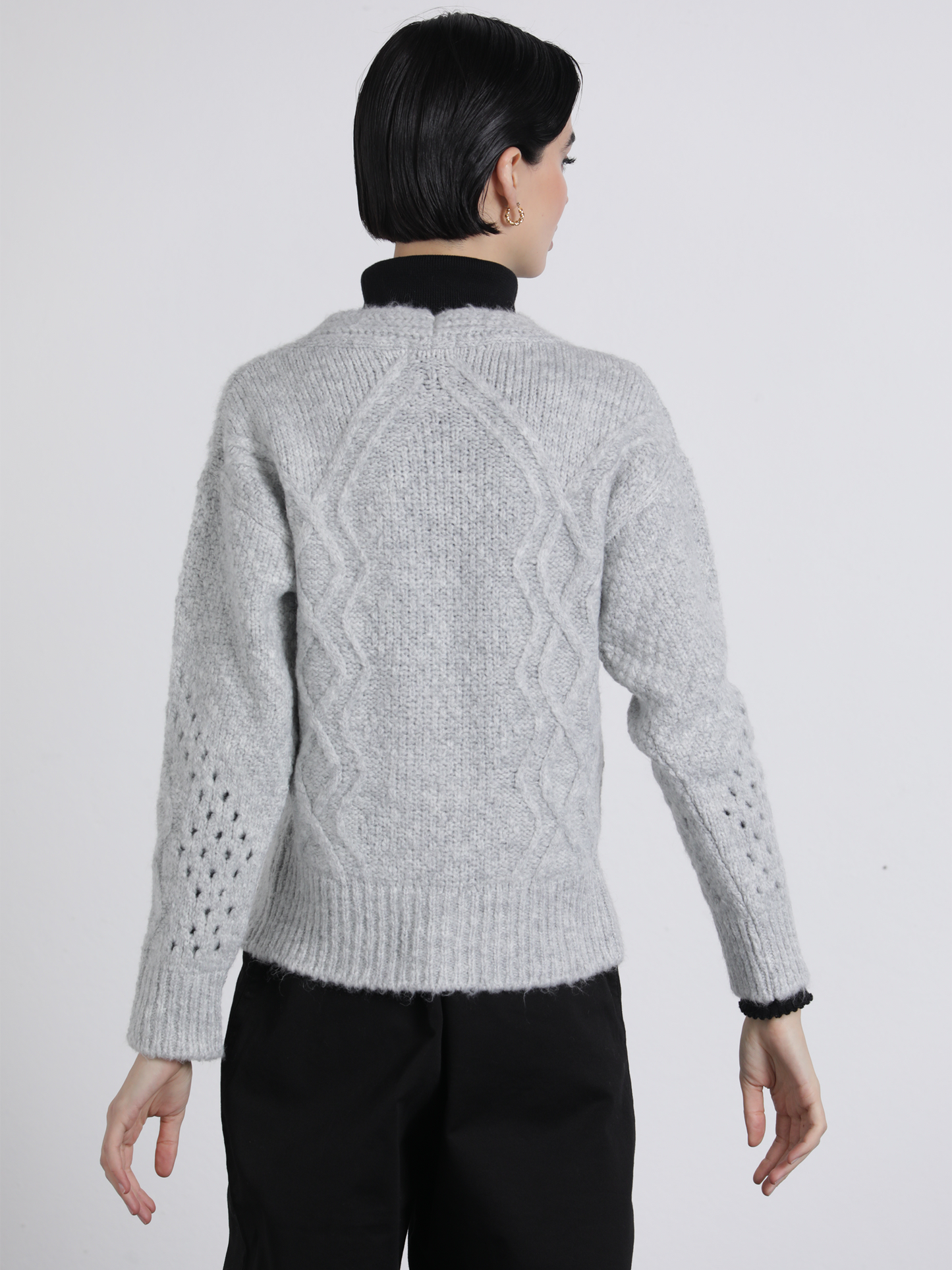 Cardigan in maglia traforata con bottoni