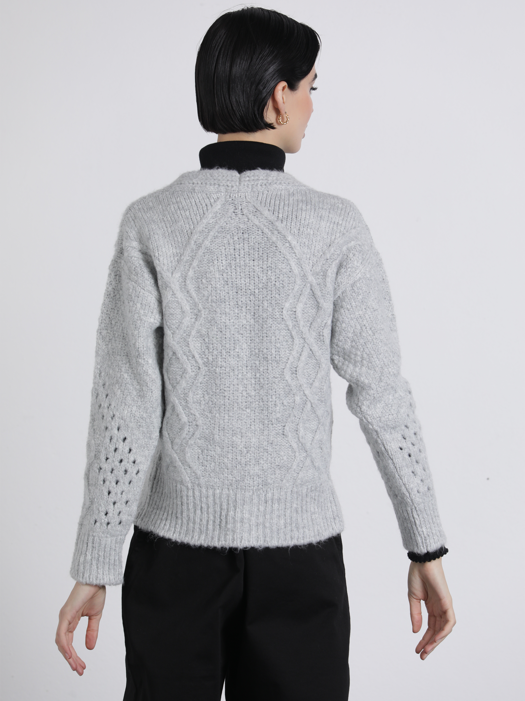 Cardigan in maglia traforata con bottoni