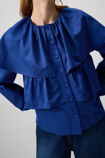 Blusa corta indaco con balze e maniche a sbuffo in cotone misto