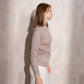 Maglione in maglia con collo alto e volant