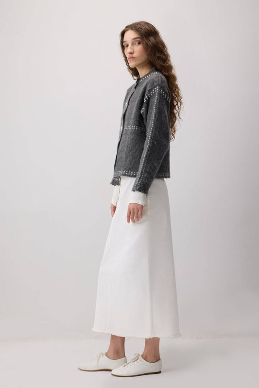 Cardigan corto bicolore con bottoni gioiello