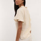 Blusa Tichka in cotone con laccetti e maniche a volant