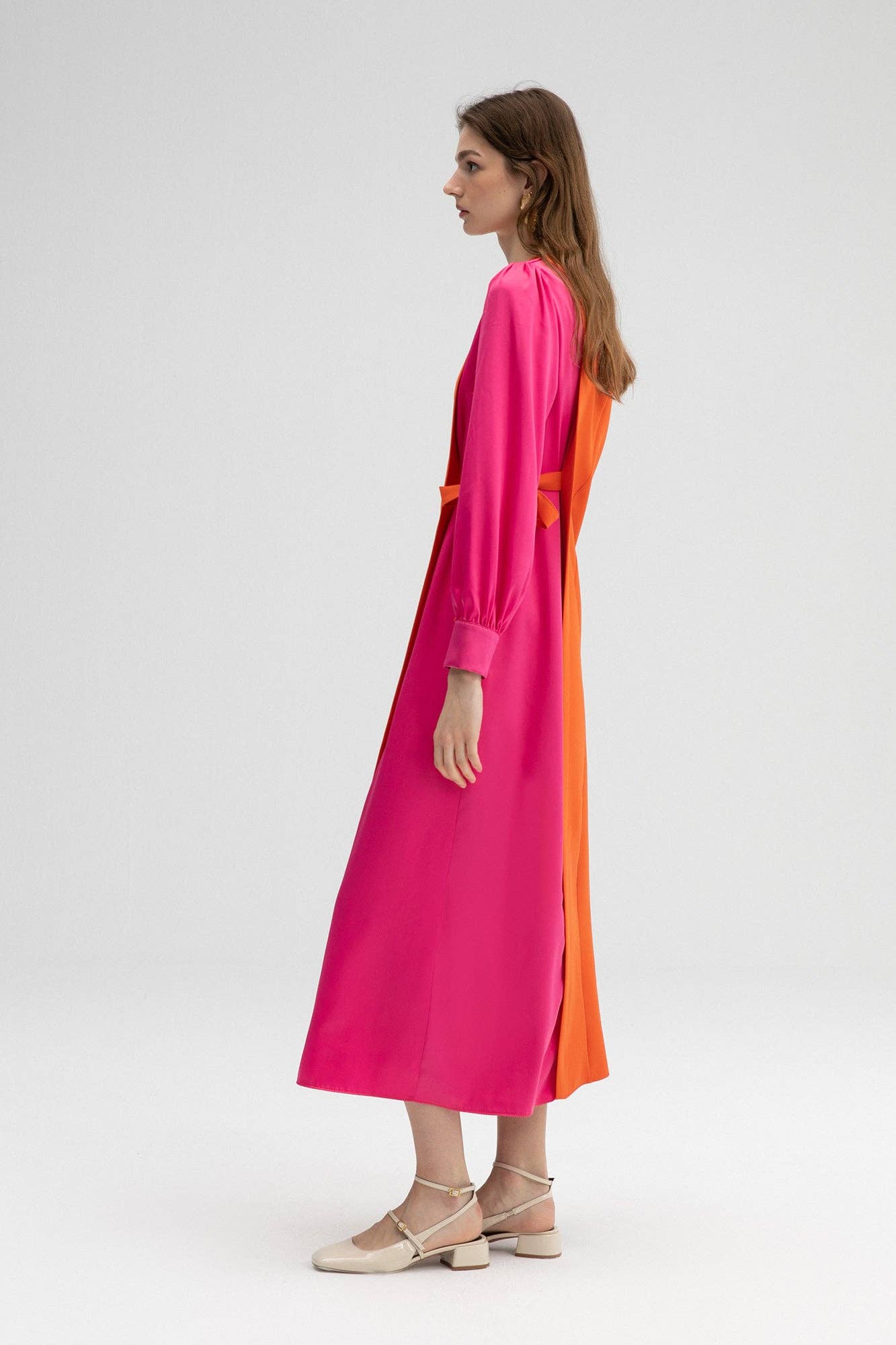 Abito lungo color block con fiocco laterale