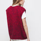 Gilet in maglia con bottoni a contrasto