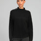 Maglione dolcevita nero Nissya con cuciture a contrasto