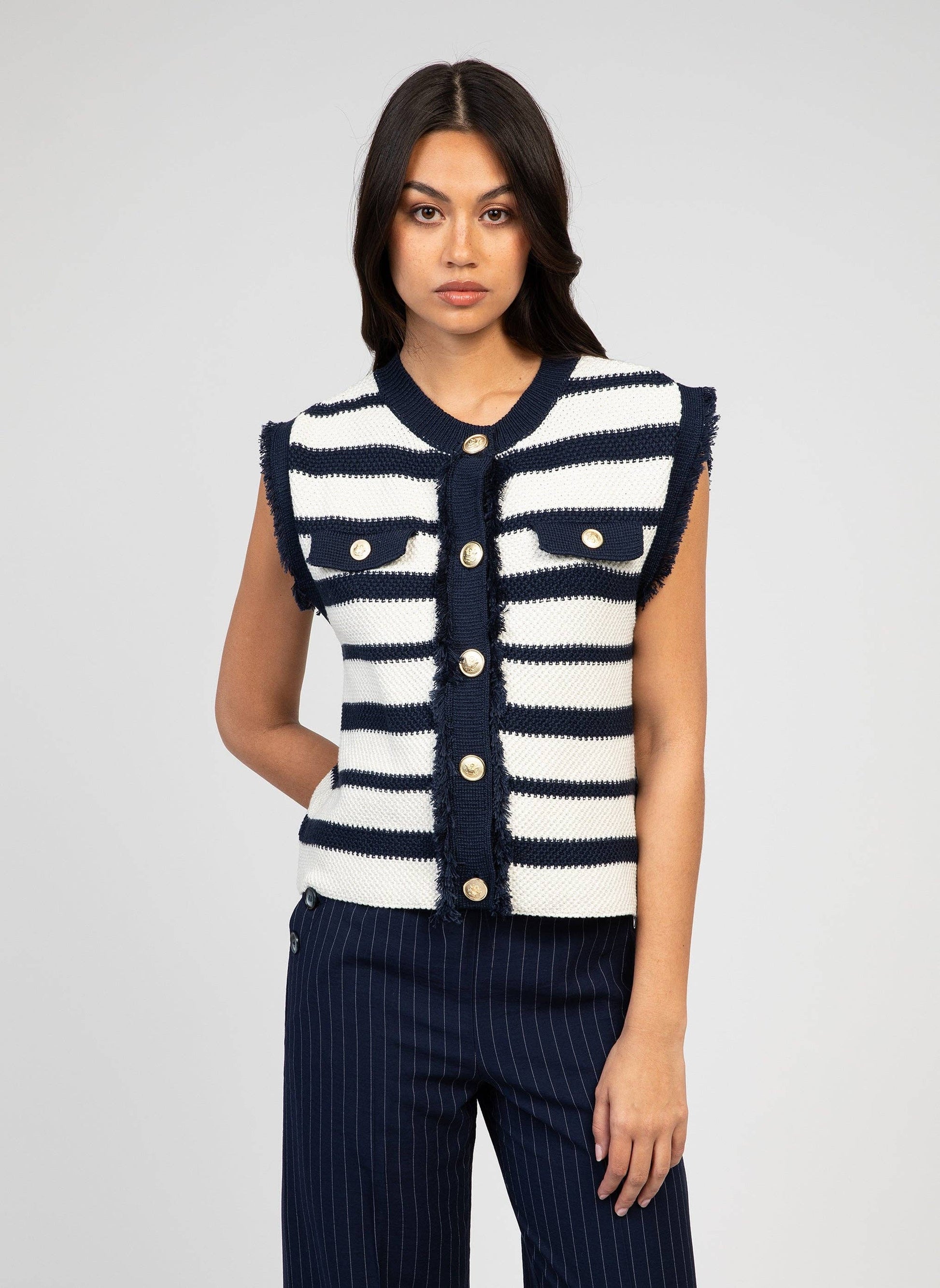 Cardigan smanicato a righe blu navy