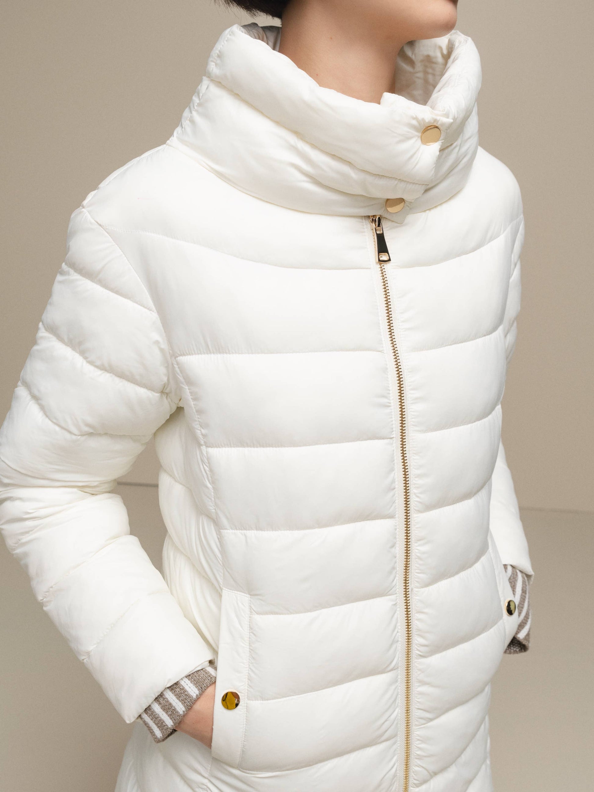 Piumino donna imbottito con collo alto