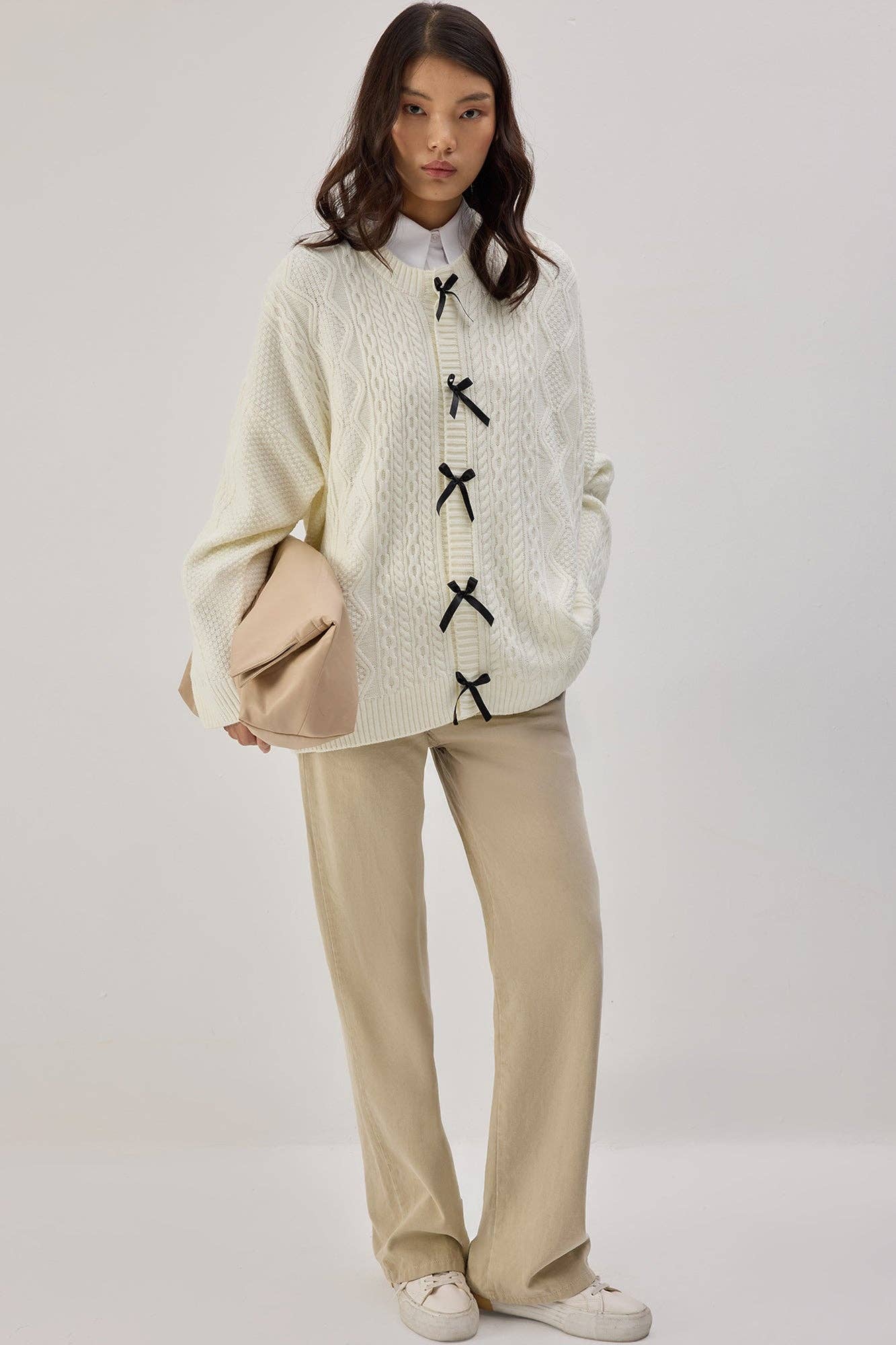 Cardigan in maglia con dettagli a fiocco
