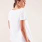 T-shirt bianca con cuori glitter