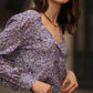 Blusa stampata floreale con scollo a V