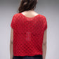 Top corto in crochet traforato dal fit ampio