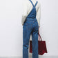 Salopette in denim blu con bretelle regolabili