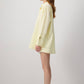 Camicia in popeline giallo burro con polsini oversize