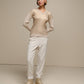 Maglione donna laminato a costine con scollo a V