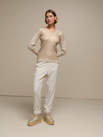 Maglione donna laminato a costine con scollo a V