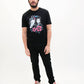 T-shirt unisex nera con stampa “La bambina, il drago e il fiore”