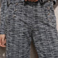 Pantaloni fluidi a gamba ampia con bottoni