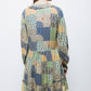 Abito stampato patchwork con volant