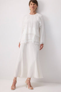 Blusa in chiffon a balze stratificate elegante