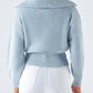 Maglia a costine con zip e collo ampio