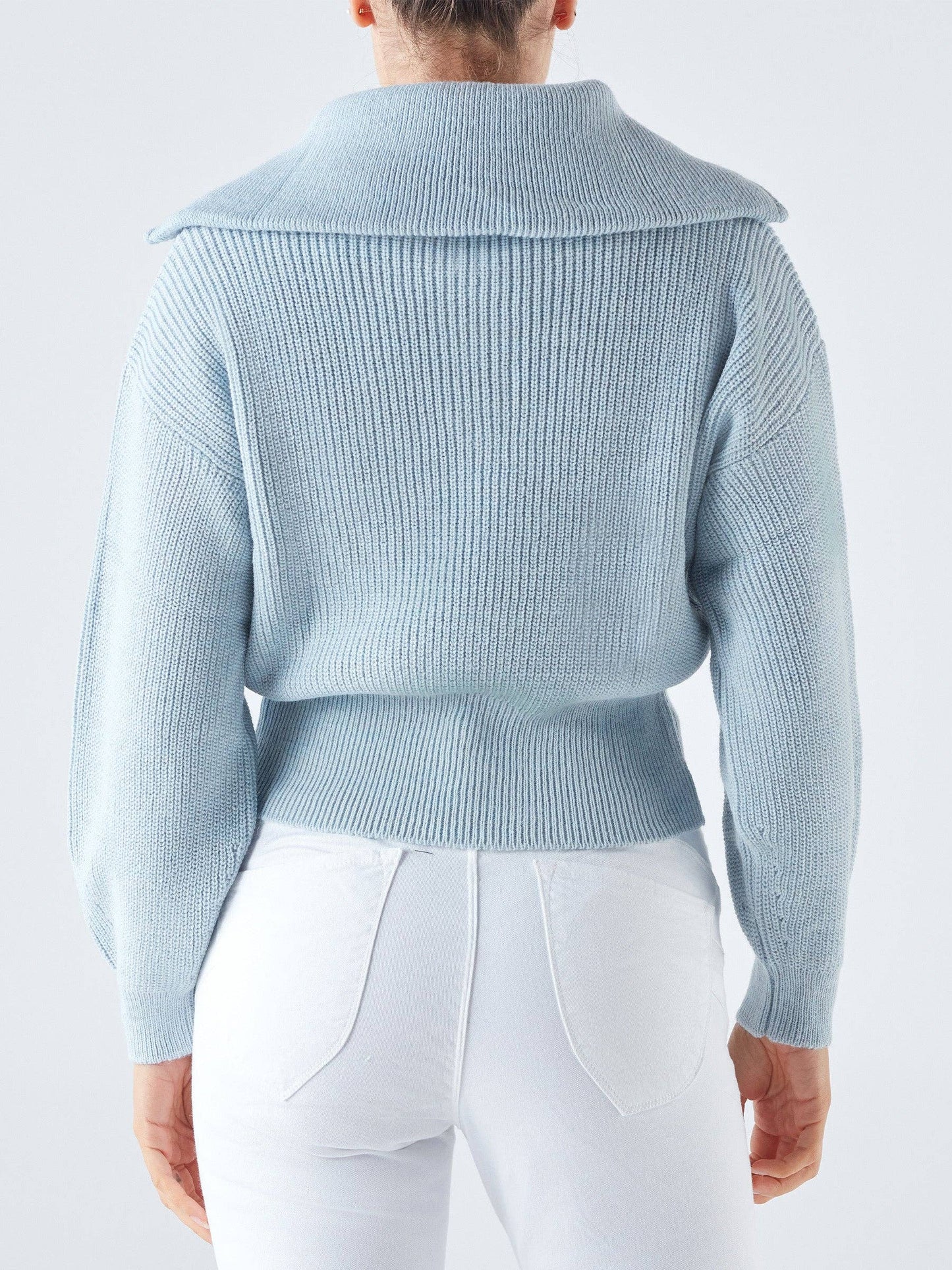 Maglia a costine con zip e collo ampio