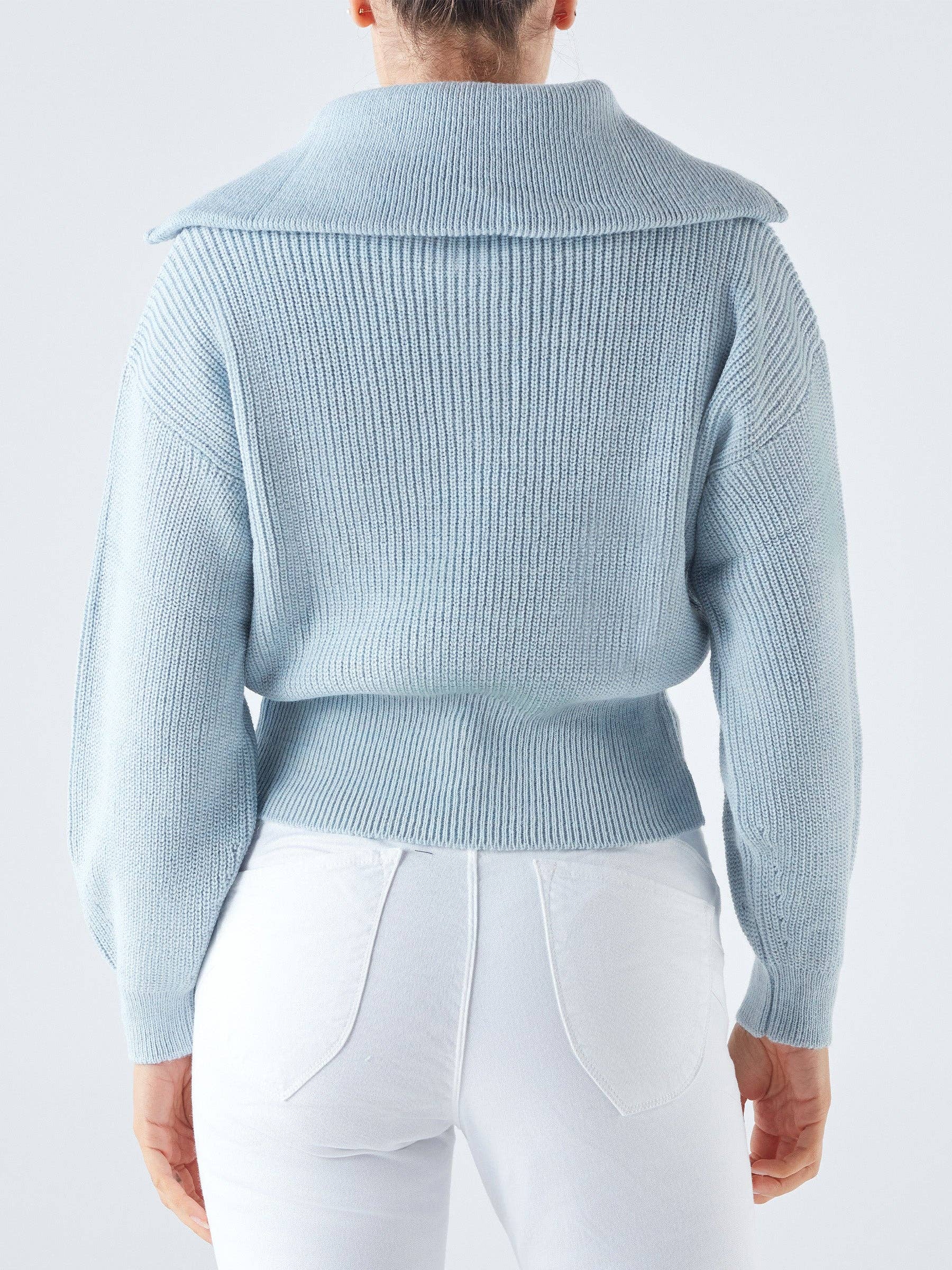 Maglia a costine con zip e collo ampio