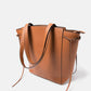 Borsa shopper in pelle sintetica con doppi manici e tracolla