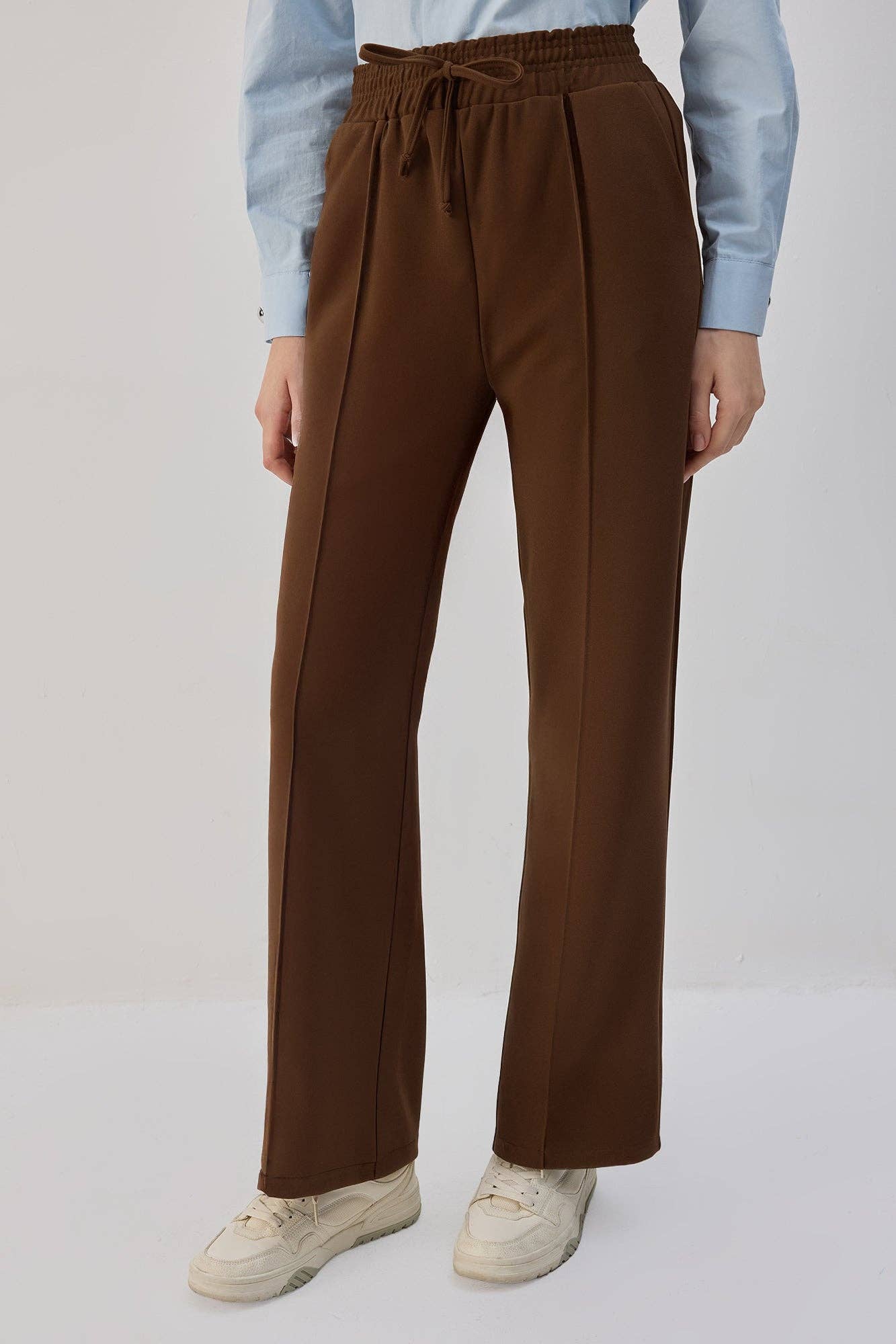 Pantaloni a coste in viscosa con elastico e coulisse in vita