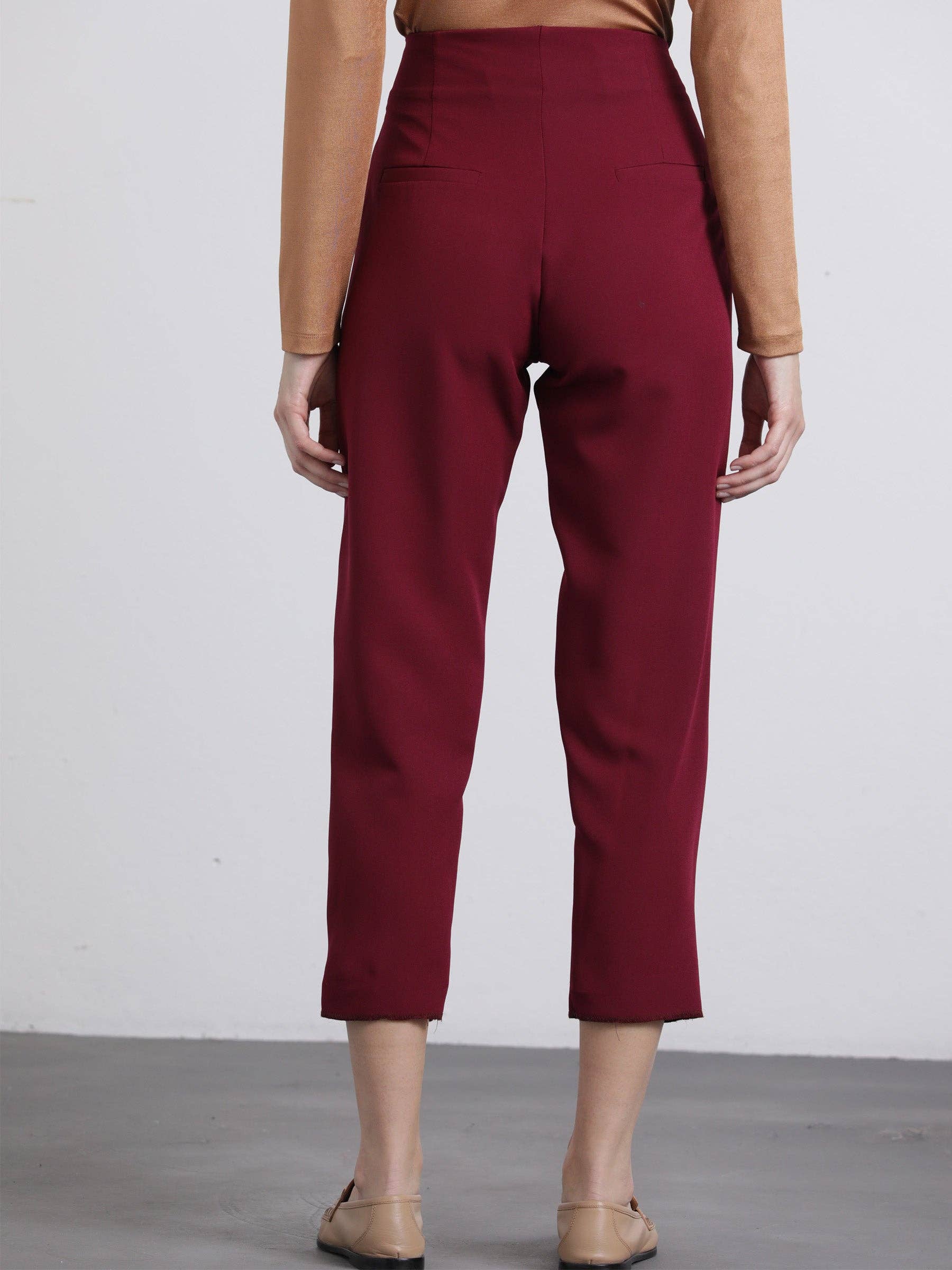 Pantaloni cropped bordeaux con bottoni dorati