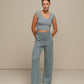 Top crop in maglia a costine con bordo ondulato