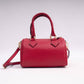 Borsa bauletto in pelle martellata con tracolla