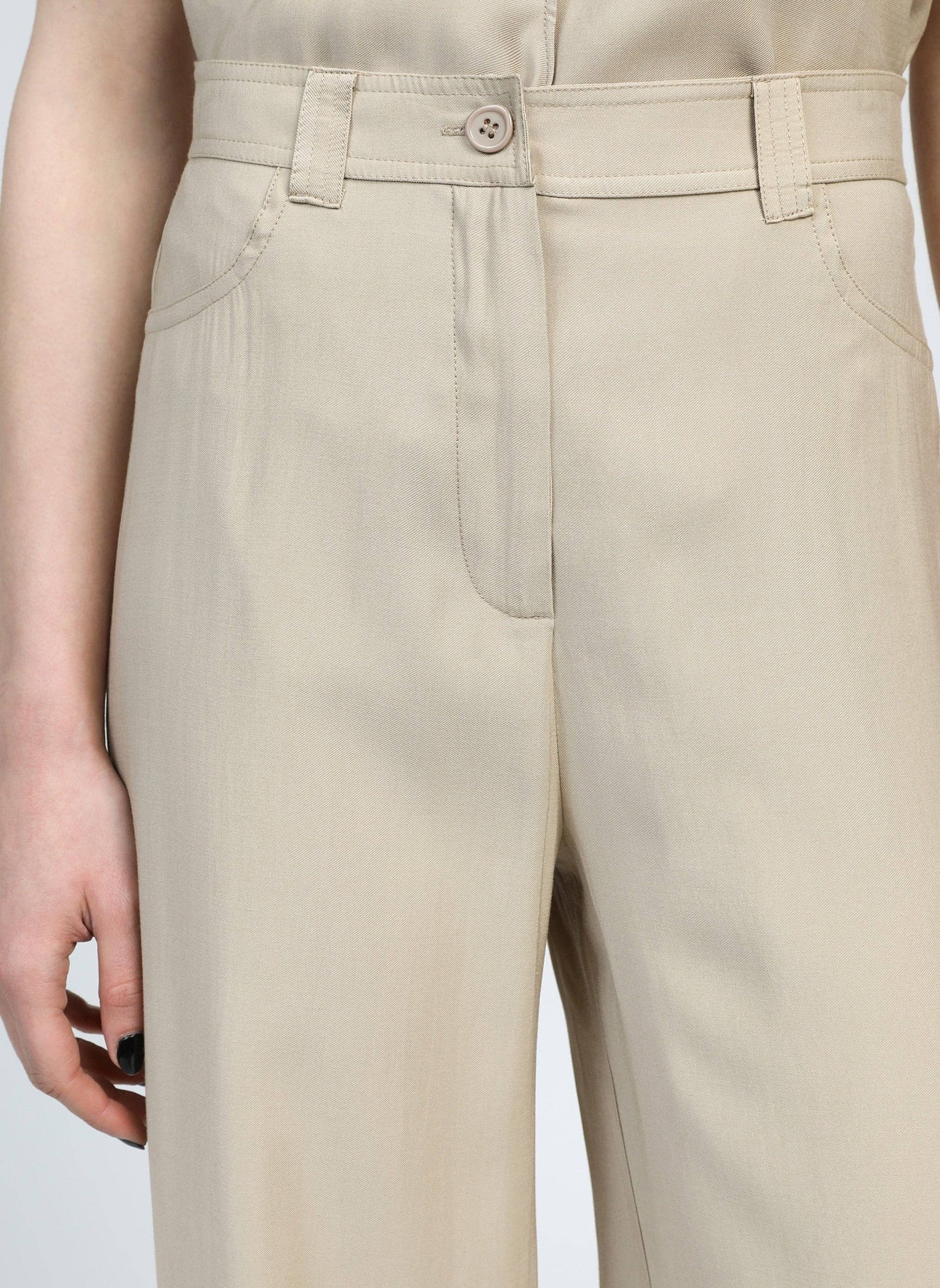 Pantaloni a zampa beige a vita alta