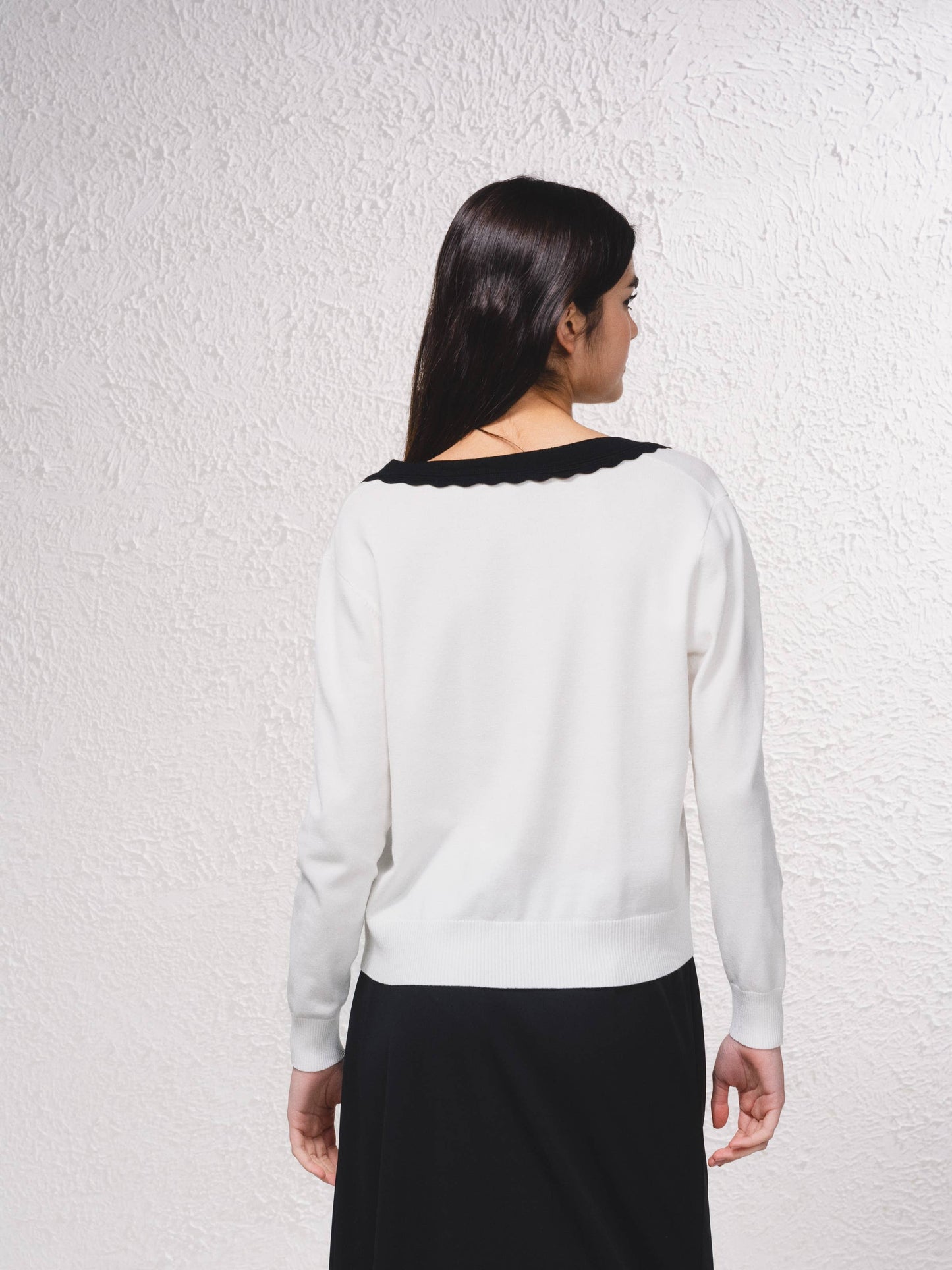 Maglione a maglia fine con scollo a V e tasche
