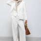 Pantaloni a gamba larga con zip laterale
